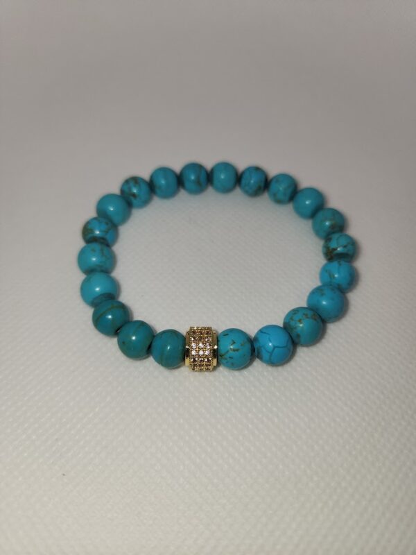 Turquoise bracelet with gold zircon showpiece